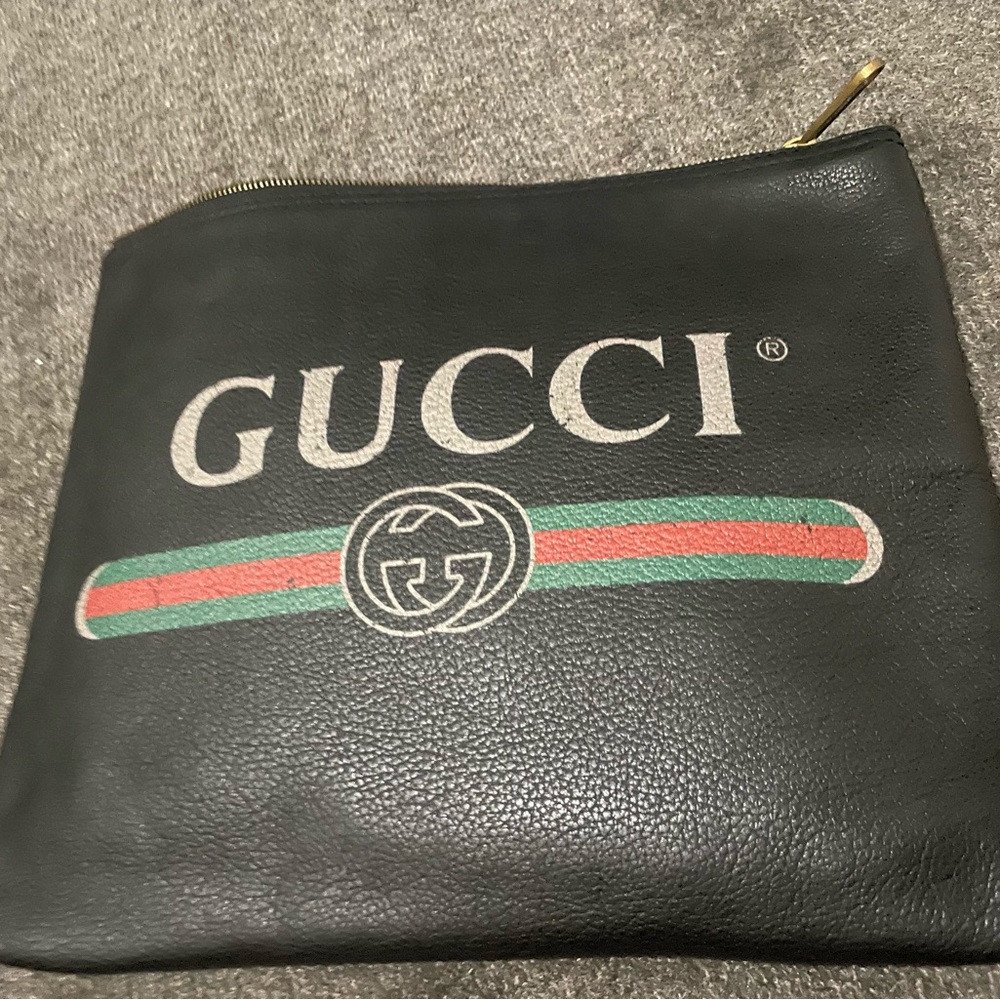Authentic Gucci pebbled leather pouch